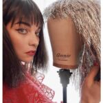 Annie Murphy Instagram - Because my name is Annie and the mannequin head also has Annie on it which is my name, so I'm holding it next to my real head. 📸: @ana_sorys