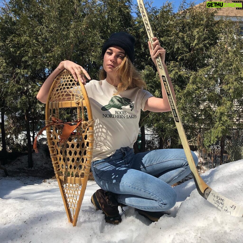 Annie Murphy Instagram - I found out that #internationalbeaverday was a thing and I immediately yelled “Mother! fetch me my hockey stick signed by @jimcuddyofficial, one snowshoe, my @roots beaver t-shirt from their limited edition collection from which 100% of the profits go to the Nature Conservancy of Canada @ncc_ccn and the protection of Canadian wildlife, my father’s boots, and photograph me on a mountain of dirty snow! I must celebrate!” #partner