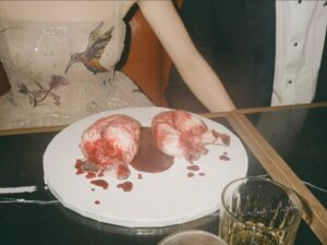 Anya Taylor-Joy Instagram - Two years ago, on April Fools, I secretly married my best friend in New Orleans. The magic of that day is ingrained in every cell of my being, forever. 
Happy second ( first ) anniversary my love…you’re the coolest🫀

N.B yes, those are anatomically correct heart cakes. Yes, I am the vampire Lestat.

📷 @caradelevingne + @sebastianfaena 

👗 beautifully embroidered with our love story by @dior