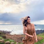 Armeena Khan Instagram - It is hard to catch a weather break. By chance, the clouds broke and I got a 10 min window to take a quick shot. #CapeCornwall behind me set the scene for a STUNNING picture. #luckyday Cape Cornwall
