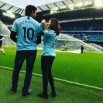 Armeena Khan Instagram – How’s the weather up there mister? @feslkhan #talldarkandhandsomeAF 😍 #mancity Etihad Stadium