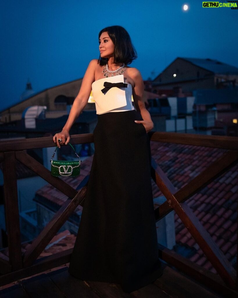 Arwa Gouda Instagram - Under the #moonlight … ♥️♥️♥️♥️♥️ #dress And #bag @maisonvalentino #jewellery @alessio_boschi_jewels DOGE PALACE’s Colombian #emerald and natural yellow #diamond necklace, which is inspired by the 14th century Venetian intricate #gothic #architecture of the city hosting its 79th Cinema Film #Festival #photographer @johannaberghorn #stylist @youmnamoustafa #arwa #arwagouda #اروى_جودة #venicefilmfestival #venicefilmfestival2022 #uniquejewelery #art #artpiece #italy #egypt #venice #fashion Venice, Italy