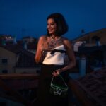 Arwa Gouda Instagram - #Love from the Venetian rooftops .. #dress and #bag @maisonvalentino #jewelry DOGE PALACE’s #Colombian #emerald and natural #yellow #diamond #necklace, inspired by the 14th century #Venetian intricate #gothic #architecture of the city hosting its 79th #Cinema #Film #Festival created by the genius @alessio_boschi_jewels #photographer @johannaberghorn #styling @youmnamoustafa #arwagouda #اروى_جودة #mahyarqajar #venicefilmfestival #venicefilmfestival2022 #uniquejewelery #art #artpiece #italy #egypt #venice #fashion Venice, Italy