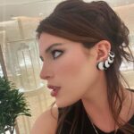 Bella Thorne Instagram - I was absolutely delighted to attend the global launch of the #CartierLibre Polymorph collection with my love🪐✨💫☄️ I had the chance to speak with Jeanne Toussaint who told me a beautiful story about how the collection unfolded in her mind. An earpiece of different stages of a solar eclipse, a jaw-dropping bracelet that transforms from day-to-night — Polymorph cultivates surprise in a collection of watches and jewelry that share a common characteristic: the ability to transform. @cartier ⭐️☀️✨