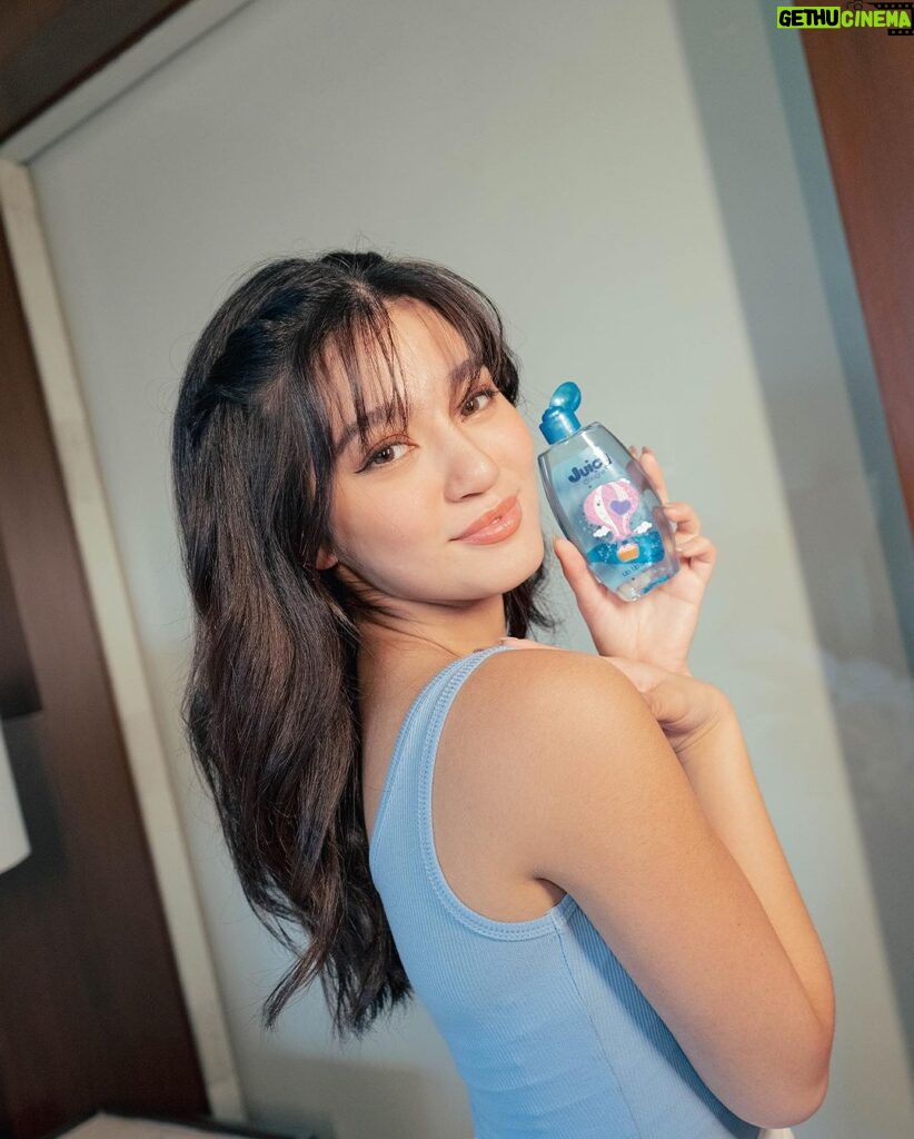 Belle Mariano Instagram - I'd just like to share this with you. I feel like there's really something magical about how @juicy_cologne‘s 'Up, Up, and Away' scent has become my daily mood booster. 💙💙 Just like my comfort food, this scent lifts my energy and takes me to a different level of joy and confidence. Every time I use this, I'm reminded to embrace the beauty around me and rise above any challenges. It's amazing how a simple scent can have such a powerful impact on our mindset. You should try it too and share with me your favorite Juicy Cologne scents!💖💖