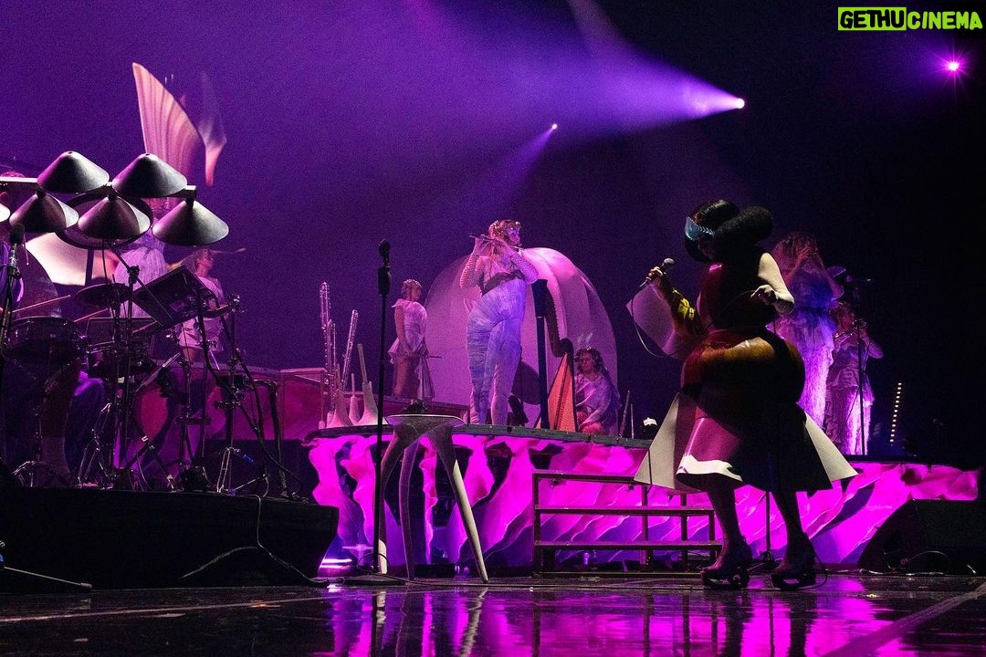 Björk Instagram - thanks for tonight Leipzig! musicians : @viibraflutes @bergurth @manudelagomusic @katiebuckleyharpist bjork wood sculpture outfit @zomer.official @xylomancia_ dress @kwkbykaykwok headpieces @james.t.merry sphæra dress @irisvanherpen musicians outfits @balmain hair @johnvialhair musicians hair @tomikono_wig makeup @isshehungry styling @eddagud photos @santiagraphy Leipzig, Germany