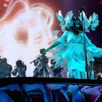 Björk Instagram - thanks for tonight Leipzig! musicians : @viibraflutes @bergurth @manudelagomusic @katiebuckleyharpist bjork wood sculpture outfit @zomer.official @xylomancia_ dress @kwkbykaykwok headpieces @james.t.merry sphæra dress @irisvanherpen musicians outfits @balmain hair @johnvialhair musicians hair @tomikono_wig makeup @isshehungry styling @eddagud photos @santiagraphy Leipzig, Germany
