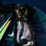 Björk Instagram - thanks for tonight kraków! musicians : @viibraflutes @bergurth @manudelagomusic @katiebuckleyharpist bjork outfit @maison_kimhekim headpieces @james.t.merry vinyl top @vaquera.nyc shoes @driesvannoten sphæra dress @irisvanherpen musicians outfits @balmain hair pieces @tomikono_wig makeup @isshehungry styling @eddagud photos @santiagraphy Kraków