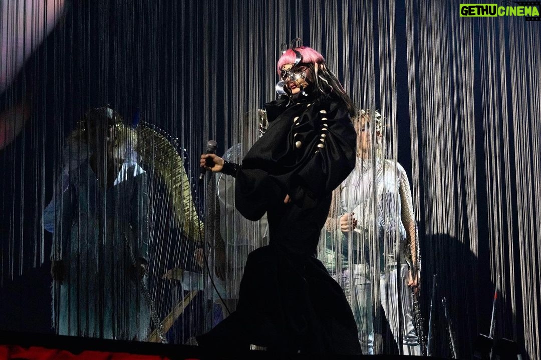 Björk Instagram - thanks for tonight kraków! musicians : @viibraflutes @bergurth @manudelagomusic @katiebuckleyharpist bjork outfit @maison_kimhekim headpieces @james.t.merry vinyl top @vaquera.nyc shoes @driesvannoten sphæra dress @irisvanherpen musicians outfits @balmain hair pieces @tomikono_wig makeup @isshehungry styling @eddagud photos @santiagraphy Kraków