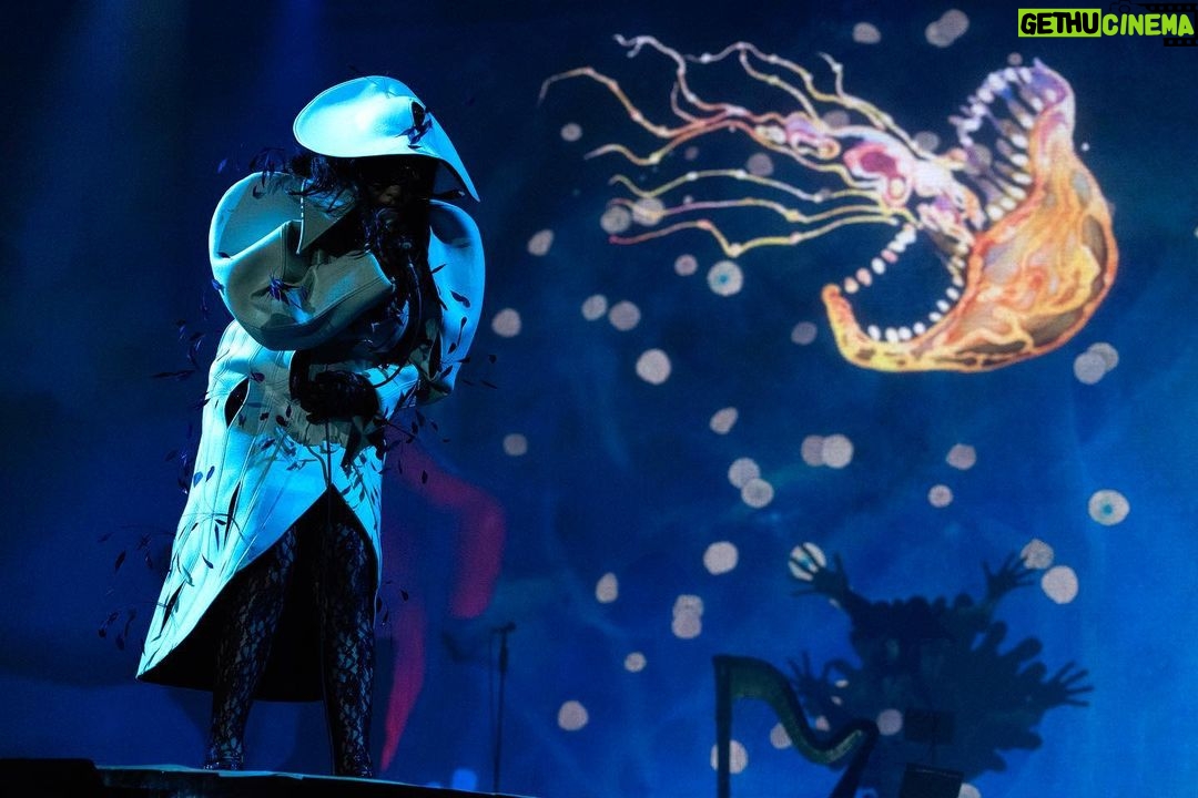 Björk Instagram - thanks for tonight bologna! musicians : @viibraflutes @bergurth @manudelagomusic @katiebuckleyharpist bjork outfit @robertwun headpieces @james.t.merry lace bodysuit @sarahregensburger_official shoes @melissaofficial x victor & rolf sphaera dress @irisvanherpen musicians outfits @balmain hair pieces @tomikono_wig makeup @andrewgallimakeup styling @eddagud photos @santiagraphy Bologna, Italy