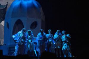Björk Instagram - thanks for tonight bologna! musicians : @viibraflutes @bergurth @manudelagomusic @katiebuckleyharpist bjork outfit @robertwun headpieces @james.t.merry lace bodysuit @sarahregensburger_official shoes @melissaofficial x victor & rolf sphaera dress @irisvanherpen musicians outfits @balmain hair pieces @tomikono_wig makeup @andrewgallimakeup styling @eddagud photos @santiagraphy Bologna, Italy