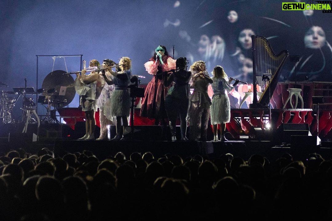 Björk Instagram - thanks for tonight vienna! It was a pleasure having one of your very own onstage tonight, manu delago. musicians : @viibraflutes @bergurth @manudelagomusic @katiebuckleyharpist bjork outfit @ndreaskronthaler @viviennewestwood headpieces @james.t.merry gloves @jan_eneskey shoes @melissaofficial x victor & rolf sphaera dress @irisvanherpen musicians outfits @balmain hair pieces @tomikono_wig makeup @isshehungry styling @eddagud photos @santiagraphy Vienna, Austria