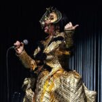 Björk Instagram - thanks for tonight prague! musicians : @viibraflutes @bergurth @manudelagomusic @katiebuckleyharpist bjork outfit @babbym headpieces @james.t.merry boots @driesvannoten sphaera dress @irisvanherpen musicians outfits @balmain hair pieces @tomikono_wig makeup @isshehungry styling @eddagud photos @santiagraphy Prague, Czech Republic