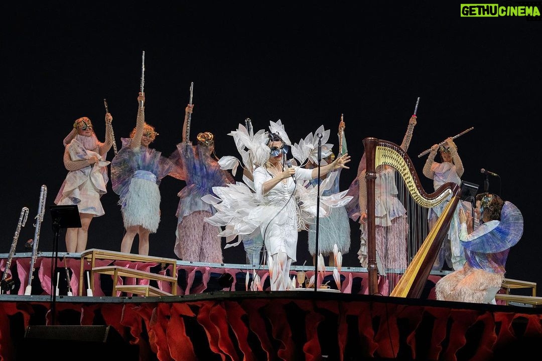 Björk Instagram - thank you milan for a magnificent evening ! musicians : @viibraflutes @bergurth @manudelagomusic @katiebuckleyharpist bjork outfit @bnnttclay.labs @bnnttclay hat @sanchez_kane headpieces @james.t.merry boots @driesvannoten encore sphaera dress @irisvanherpen musicians outfits @balmain hair pieces @tomikono_wig makeup @isshehungry styling @eddagud photos @santiagraphy