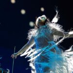Björk Instagram - @coachella thank you for a magical evening !! conductor @bjarnifrimann orchestra : hollywood string ensemble björk dress @noirkeininomiya headpiece @james.t.merry bodysuit @solangel led sound reacting dress @claradaguin silver skirt @weishengparis makeup @isshehungry bjarni frímann top @maisonvalentino skirt @weishengparis styling @eddagud photos @santiagraphy drone photos @charles.reagan mask design & 3D sculpt @james.t.merry mask production @secca_kanazawa 3D printing support by DMM.make mask technical direction @suganokaoru producer : reiko kunieda drone light performance by @studio.drift @dronestories.show @twofiftyk @novaskystories björk creative direction : björk , @james.t.merry Coachella