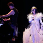 Björk Instagram - thanks for tonight kobe ! conductor @bjarnifrimann orchestra : muroya strings björk dress @noirkeininomiya headpiece @james.t.merry hair @tomikono_wig bjarni frímann top @_julius7officialstore.jp bjarni frímann skirt @black_commedesgarcons x @nike makeup @isshehungry styling @eddagud photos @santiagraphy Kobe, Japan