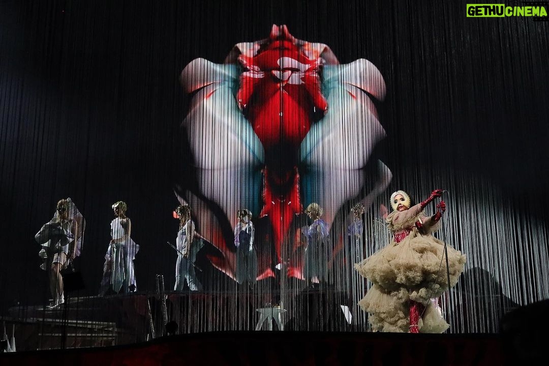Björk Instagram - thank you lisbon for a wonderful evening ! musicians : hamrahlíð choir , @viibraflutes , @bergurth , @manudelagomusic , @katiebuckleyharpist björk dress @noirkeininomiya lace bodysuit @sarahregensburger_official headpieces @james.t.merry shoes @maisonmargiela encore outfits @irisvanherpen & @noirkeininomiya bodysuit by helen miraudo musicians outfits @balmain hair pieces @tomikono_wig makeup @isshehungry hair @_vascofreitas_ styling @eddagud photos @santiagraphy #cornucopia Lisbon, Portugal