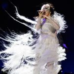 Björk Instagram – @coachella
conductor @bjarnifrimann
orchestra : hollywood string ensemble
björk dress @noirkeininomiya
headpiece @james.t.merry
bodysuit @solangel
makeup @isshehungry
bjarni frímann top @maisonvalentino
skirt @weishengparis
styling @eddagud
photos @santiagraphy
drone photos @charles.reagan
mask production @secca_kanazawa
3D printing support by DMM.make
mask technical direction @suganokaoru
producer : reiko kunieda.
drone light performance by
@studio.drift
@dronestories.show
@twofiftyk
@novaskystories
björk creative direction :
björk , @james.t.merry