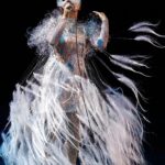 Björk Instagram - @coachella conductor @bjarnifrimann orchestra : hollywood string ensemble björk dress @noirkeininomiya headpiece @james.t.merry bodysuit @solangel makeup @isshehungry bjarni frímann top @maisonvalentino skirt @weishengparis styling @eddagud photos @santiagraphy drone photos @charles.reagan mask production @secca_kanazawa 3D printing support by DMM.make mask technical direction @suganokaoru producer : reiko kunieda. drone light performance by @studio.drift @dronestories.show @twofiftyk @novaskystories björk creative direction : björk , @james.t.merry