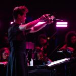 Björk Instagram - @coachella thank you for a magical evening !! conductor @bjarnifrimann orchestra : hollywood string ensemble björk dress @noirkeininomiya headpiece @james.t.merry bodysuit @solangel led sound reacting dress @claradaguin silver skirt @weishengparis makeup @isshehungry bjarni frímann top @maisonvalentino skirt @weishengparis styling @eddagud photos @santiagraphy drone photos @charles.reagan mask design & 3D sculpt @james.t.merry mask production @secca_kanazawa 3D printing support by DMM.make mask technical direction @suganokaoru producer : reiko kunieda drone light performance by @studio.drift @dronestories.show @twofiftyk @novaskystories björk creative direction : björk , @james.t.merry Coachella