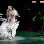 Björk Instagram - @coachella thank you for a magical evening !! conductor @bjarnifrimann orchestra : hollywood string ensemble björk dress @noirkeininomiya headpiece @james.t.merry bodysuit @solangel led sound reacting dress @claradaguin silver skirt @weishengparis makeup @isshehungry bjarni frímann top @maisonvalentino skirt @weishengparis styling @eddagud photos @santiagraphy drone photos @charles.reagan mask design & 3D sculpt @james.t.merry mask production @secca_kanazawa 3D printing support by DMM.make mask technical direction @suganokaoru producer : reiko kunieda drone light performance by @studio.drift @dronestories.show @twofiftyk @novaskystories björk creative direction : björk , @james.t.merry Coachella