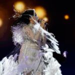 Björk Instagram - @coachella thank you for a magical evening !! conductor @bjarnifrimann orchestra : hollywood string ensemble björk dress @noirkeininomiya headpiece @james.t.merry bodysuit @solangel led sound reacting dress @claradaguin silver skirt @weishengparis makeup @isshehungry bjarni frímann top @maisonvalentino skirt @weishengparis styling @eddagud photos @santiagraphy drone photos @charles.reagan mask design & 3D sculpt @james.t.merry mask production @secca_kanazawa 3D printing support by DMM.make mask technical direction @suganokaoru producer : reiko kunieda drone light performance by @studio.drift @dronestories.show @twofiftyk @novaskystories björk creative direction : björk , @james.t.merry Coachella