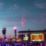 Björk Instagram - dear audience i wanted to share with you excitedly that i was joined with 864 drones tonight !!! as you probably know i am touring with 2 very different concerts these days , cornucopia : very complex , tons of screens , bespoke instruments and celebrates the techno side in me ... the show tonight was orkestral which is me , all about simplicity , only conductor @bjarnifrimann and orchestra playing a selection of my songs . so in honour of @coachella magnificent festival ( i played here first 21 years ago pregnant ) i asked artist duo @studio.drift , to join us . i have always been very interested in digital notation and the abstraction of tonality being visual so hopefully the audience got slashes of synesthesia while watching . me and @james.t.merry came with the theme to the shapes ... we wanted to do architectural and biological movements , curves .... i do hope you enjoyed it warmthness björk drone light performance by : @studio.drift @dronestories.show @twofiftyk @novaskystories björk team creative direction : @bjork @james.t.merry photos @calder #björkestral #coachella #droneshow