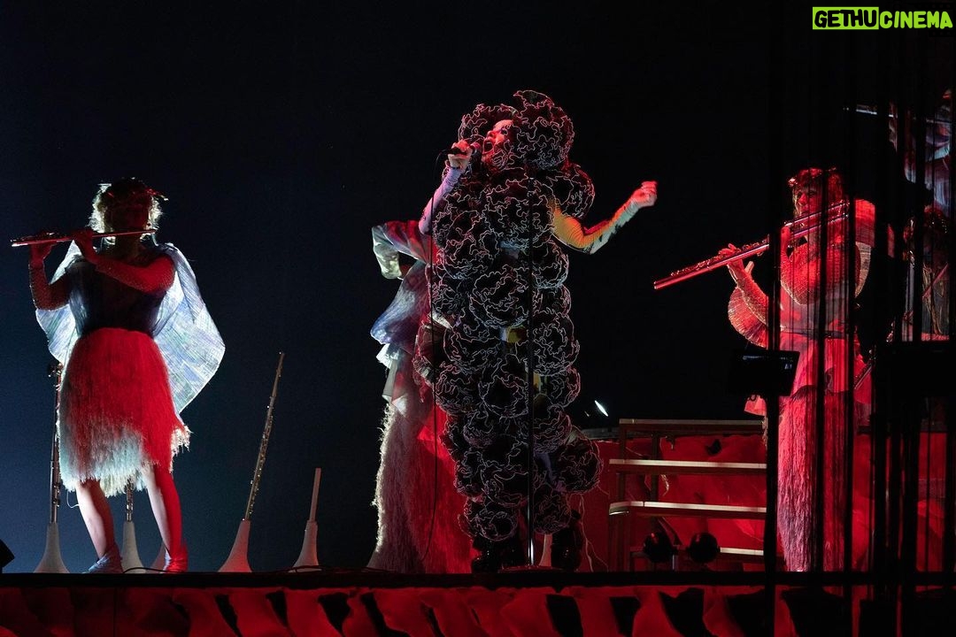 Björk Instagram - thank you tokyo for a great evening and thank you @kasimyn for joining us ! musicians @viibraflutes , @bergurth , @manudelagomusic , @katiebuckleyharpist , @kasimyn choir : @utabito_zanmai_samady photos @santiagraphy björk outfits @noirkeininomiya printed bodysuit @thorastefansdottir kas outfit @tomokoizumi all band outfits @balmain all headpieces @james.t.merry all hairpieces @tomikono_wig makeup @isshehungry styling @eddagud