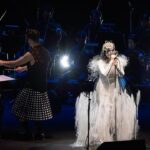 Björk Instagram - thanks for tonight kobe ! conductor @bjarnifrimann orchestra : muroya strings björk dress @noirkeininomiya headpiece @james.t.merry hair @tomikono_wig bjarni frímann top @_julius7officialstore.jp bjarni frímann skirt @black_commedesgarcons x @nike makeup @isshehungry styling @eddagud photos @santiagraphy Kobe, Japan
