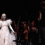 Björk Instagram - thanks for tonight kobe ! conductor @bjarnifrimann orchestra : muroya strings björk dress @noirkeininomiya headpiece @james.t.merry hair @tomikono_wig bjarni frímann top @_julius7officialstore.jp bjarni frímann skirt @black_commedesgarcons x @nike makeup @isshehungry styling @eddagud photos @santiagraphy Kobe, Japan