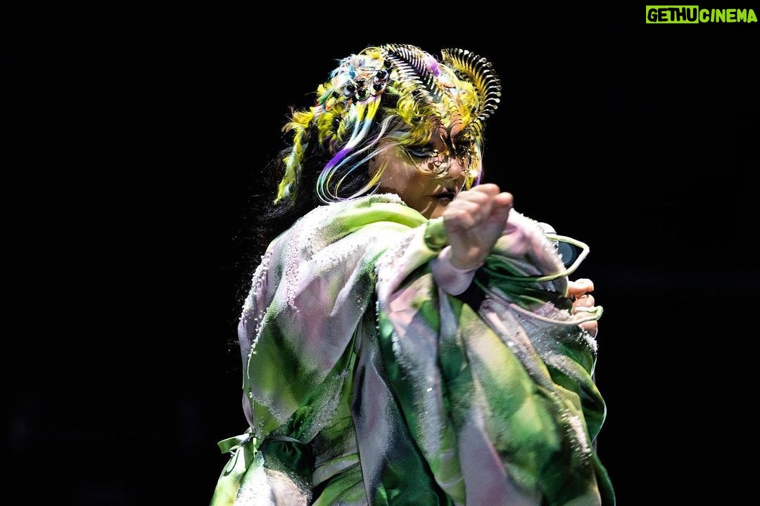 Björk Instagram - thanks for tonight tokyo ! conductor @bjarnifrimann orchestra : muroya strings headpiece @james.t.merry björk costume dress @delcoreofficial @danieldelcore bjarni outfit @__obsess__ hair @tomikono_wig makeup @isshehungry styling @eddagud photos @santiagraphy Tokyo, Japan