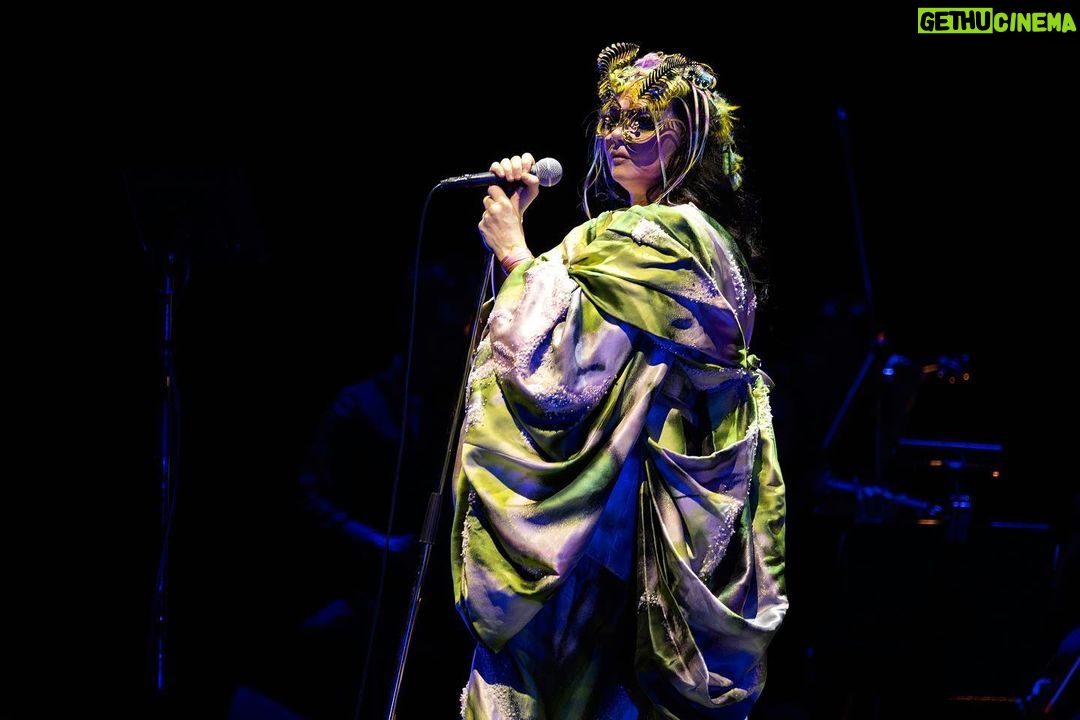 Björk Instagram - thanks for tonight tokyo ! conductor @bjarnifrimann orchestra : muroya strings headpiece @james.t.merry björk costume dress @delcoreofficial @danieldelcore bjarni outfit @__obsess__ hair @tomikono_wig makeup @isshehungry styling @eddagud photos @santiagraphy Tokyo, Japan