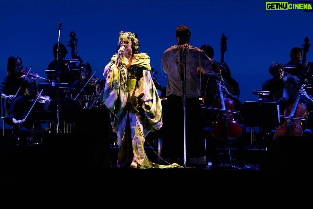 Björk Instagram - thanks for tonight tokyo ! conductor @bjarnifrimann orchestra : muroya strings headpiece @james.t.merry björk costume dress @delcoreofficial @danieldelcore bjarni outfit @__obsess__ hair @tomikono_wig makeup @isshehungry styling @eddagud photos @santiagraphy Tokyo, Japan