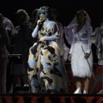 Björk Instagram - thanks for tonight @perthfest ! musicians @viibraflutes , @bergurth , @manudelagomusic , @katiebuckleyharpist choir @voyces_perth photos @santiagraphy headpieces @james.t.merry björk dress @julia__heuer lace bodysuit @undercover_lab all band outfit @balmain @hairpiece @tomikono_wig makeup @isshehungry styling @eddagud Perth, Western Australia