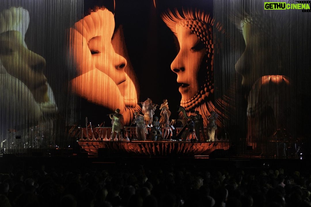 Björk Instagram - thanks for tonight @perthfest ! musicians @viibraflutes , @bergurth , @manudelagomusic , @katiebuckleyharpist choir @voyces_perth photos @santiagraphy headpieces @james.t.merry björk dress @julia__heuer lace bodysuit @undercover_lab all band outfit @balmain @hairpiece @tomikono_wig makeup @isshehungry styling @eddagud Perth, Western Australia