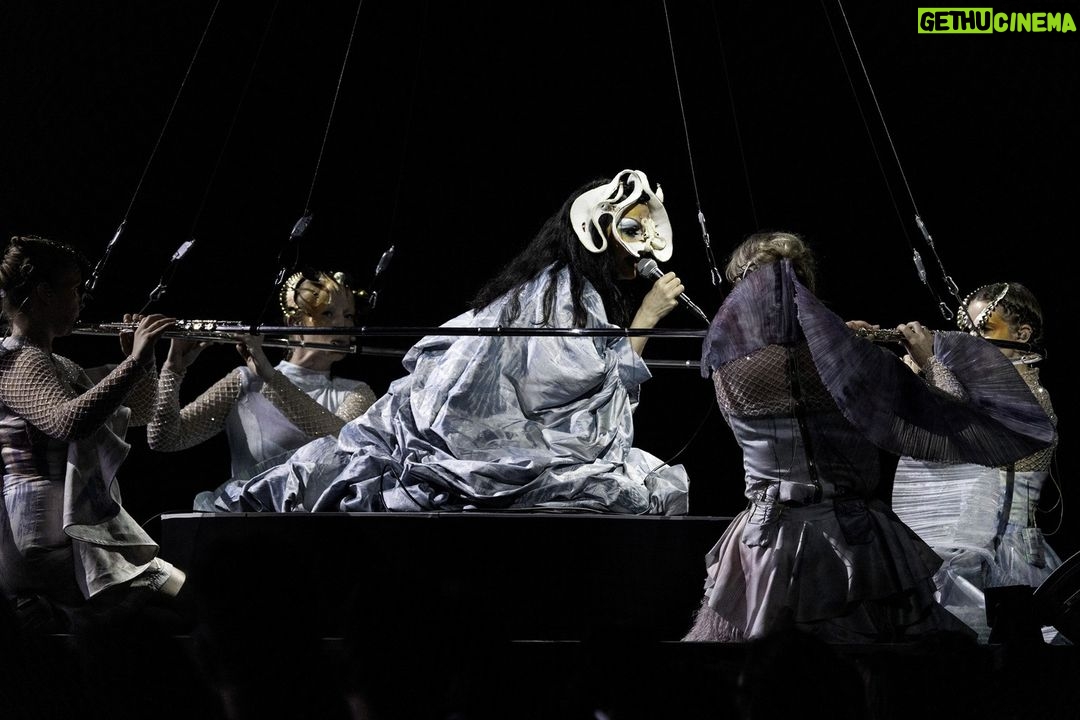 Björk Instagram - thanks for tonight @perthfest ! musicians @viibraflutes , @bergurth , @manudelagomusic , @katiebuckleyharpist choir @voyces_perth photos @santiagraphy björk dress @romancewasborn all band outfits @balmain headpieces @james.t.merry makeup @isshehungry styling @eddagud Perth, Western Australia