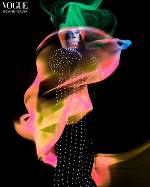 Björk Instagram - for vogue scandinavia @voguescandinavia 

photos: viðar logi @vidarlogi 
stylist: edda gudmundsdottir @eddagud 
masks: james merry @james.t.merry 
makeup: andrew gallimore @andrewgallimakeup 
hair stylist: olivier schawalder @olivierschawalder 
manicurist: cam tran @cam.t.artist 
set designer: sophear van @sophear_van 
assistant: sverrir páll sverrisson @sverrirps 
executive production: directors lab @directors_lab 
local production: lotti projects @lottiprojects 

hand embroidered dragonfly in petri dish: rahul mishra @rahulmishra_7 
black dress: henrik vibskov @henrikvibskov 
"fascia" mask: james merry @james.t.merry 
lace bodysuit: sinèad gorey @sineadgoreylondon 
shoes by jean paul gaultier haute couture by simone rocha @jeanpaulgaultier @simonerocha_ 

jacket with inflatable orbs: straytukay @straytukay 
blue/red gradient print dress: kuai li @quine_li_ 
"fascia" mask: james merry @james.t.merry 

light and sound reactive dress: clara daguin @claradaguin 
aura mask: james merry @james.t.merry 

sculptural garment: leo prothmann @leoprothmann 
silver aura handmade face piece: james merry @james.t.merry 
corset: vivienne westwood @viviennewestwood 
trouser boots: bonnetje @bonnetje.official 

blue outfit: bad binch tongtong @bad_binch_tongtong 
aura mask: james merry @james.t.merry 
bodysuit: maison close @maison_close 
ring: benas staskauskas @staskauskas.jewelry 
tights: burc akyol @burcakyol 
merged pumps: bonnetje @bonnetje.official 
harp: camac harps @camacharps