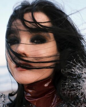 Björk Instagram - i am so honoured to be featured in purple magazine ... it is kinda nuts it is my first time as i recently tidied up my garage and found boxes of old issues ... and strangely enough for some education gave them all to an up and coming photographer in iceland in the middle of covid . the world arranges itself in mysterious and miraculous ways and now few years later that same photographer @vidarlogi is capturing me for the cover in iceland ́s red lava hills .

i would like to thank especially my interviewer @ubi.sunt for initiating this , picking a lush location and an extremely fertile dialogue that is still crocheting it ́s way around my brain ... my inner neurology gently vibrating in the aftershock : i bow , i bow . thanks to @james.t.merry , @eddagud , @joanlbert , @sverrirps , @sunnabjorkmakeup , @steinunnhairstylist for all the help on a sublime day in nature . and to @ozpurple for fighting the integrity fight through decades of keeping niche media relevant and evolving in changing times

@purplefashionmagazine 
outfits @noirkeininomiya 
shoes @grounds.official