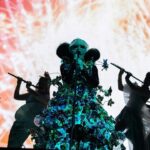Björk Instagram - thanks for tonight nantes! musicians : @viibraflutes @bergurth @manudelagomusic @katiebuckleyharpist bjork dress @delcoreofficial @danieldelcore latex bodysuit @xvenusprototypex shoes @maisonmargiela floral dress @marni headpieces @james.t.merry musicians outfits @balmain hair @johnvialhair musicians hair @tomikono_wig makeup @isshehungry styling @eddagud photos @santiagraphy Nantes, France
