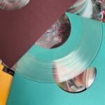 Björk Instagram - the fossora box set designed by @mmparisdotcom available via link in bio Includes: 5 reimagined tracks on 2 x 10” crystal clear vinyl 100% silk oversized scarf 2 x fine art pigment prints atopos score book illustrated booklet music notebook fossora alphabet poster certificate of authenticity