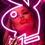 Carmen Electra Instagram - a kiss from a playmate lasts 4ever 💋🐰 @reservedmagazine photos by @jamienelson6 makeup @moidariandarling hair @stuntzbeauty stylist @jamesmr_style production @ericacornwall location @daveshuten @galpinautosports nails @britneytokyo #playboy #playmate #magazine #shoot #makeup #kiss #lips #carmenelectra Link in Bio