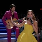 Carolina Gaitán Instagram - Cantar en los Oscars con la convicción de que hago esto desde niña, de saber que es lo que amo, lo que me llena y lo que le ha tocado el corazón a tantos al rededor del mundo con #wedonttalkaboutbruno @encantomovie se siente como una voz en alto por mi país y por la latinidad! Gracias @theacademy @encantomovie #linmanuelmiranda 💛💙❤️ Performing at the Oscars knowing that this is what I’ve been doing since I’m a little girl, knowing this is what I love to do, and what have been touching and moving hearts around the world with #wedonttalkaboutbruno feels like representing my country Colombia and my latin@ comunity!!! Thanks @theacademy and THANKS @encantomovie #linmanuelmiranda #pepamadrigal Dolby Theater
