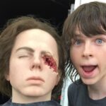 Chandler Riggs Instagram - i’m so humbled to have been on such an incredible show, around so many amazing people. the cast, the crew, the producers, directors, everyone. it’s a little surreal to think that the main show is over, but there’s so much more to the TWD universe that’s yet to come. thank you everyone for having me as such a beloved character ❤️ 1. pic of me on the last day of the finale! they tossed me in the background of one of the shots at hilltop 2. the mannequin that andy carried instead of me because i could only work for 10 hours and had to wrap early 3. my first time with the eye makeup on, i was so excited but quickly realized how awful the next few years were going to be. no depth perception, acting with one eye, so much less field of vision… 😰 4. the fantastic @cudlitz in our season 6 finale, we were all crammed in that RV but man the comradery during that episode was something else. 5. i can’t remember who it was, but someone wanted to take this awesome picture of me and andy in the woods - also during our season 6 finale 6. just andy staring at some garbage (jokes aside, our set dec department was SO talented. it was an honor to see their work on a daily basis) 7. san diego comic con 2016, height of the show. there were thousands and thousands of people screaming at us, showing how much they loved the show 8. episode 808 - we blew up HOUSES. i was pretty sad to leave the show, but getting an awesome exit like this made it all worth it. 9. some random season 5 BTS, this was like our 5th set of twins that we used for baby judith. i’d always get to the point where the babies wouldn’t completely hate me, and then they’d be too big and would need to be switched out and i’d have to start all over again ☹️ thank you again for everything. see you soon ❤️