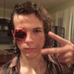 Chandler Riggs Instagram - i’m so humbled to have been on such an incredible show, around so many amazing people. the cast, the crew, the producers, directors, everyone. it’s a little surreal to think that the main show is over, but there’s so much more to the TWD universe that’s yet to come. thank you everyone for having me as such a beloved character ❤️ 1. pic of me on the last day of the finale! they tossed me in the background of one of the shots at hilltop 2. the mannequin that andy carried instead of me because i could only work for 10 hours and had to wrap early 3. my first time with the eye makeup on, i was so excited but quickly realized how awful the next few years were going to be. no depth perception, acting with one eye, so much less field of vision… 😰 4. the fantastic @cudlitz in our season 6 finale, we were all crammed in that RV but man the comradery during that episode was something else. 5. i can’t remember who it was, but someone wanted to take this awesome picture of me and andy in the woods - also during our season 6 finale 6. just andy staring at some garbage (jokes aside, our set dec department was SO talented. it was an honor to see their work on a daily basis) 7. san diego comic con 2016, height of the show. there were thousands and thousands of people screaming at us, showing how much they loved the show 8. episode 808 - we blew up HOUSES. i was pretty sad to leave the show, but getting an awesome exit like this made it all worth it. 9. some random season 5 BTS, this was like our 5th set of twins that we used for baby judith. i’d always get to the point where the babies wouldn’t completely hate me, and then they’d be too big and would need to be switched out and i’d have to start all over again ☹️ thank you again for everything. see you soon ❤️