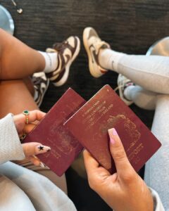 Chloe Burrows Instagram - Besties who travel together and wear matching @whitefoxboutique hoodies 😉✨ let’s gooooo 🇺🇸 Oh and matching dirty old passports 😅 ad Use code MILLIEGRACE or CHLOEB for 30% discount off the website 🫶🏼 Heathrow Airport
