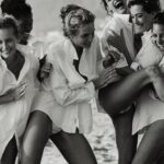 Christy Turlington Instagram - I learned about the sudden passing of Tatjana Patitz when I landed at an airport on the same coast earlier today. Ever since, all I can see is her face, hear her voice, and of course am flooded with memories. Tatjana embodied, to me, European sophistication and style when I met her. Of the many shoots and memories we shared since we first met in 1985, the first one was most present today. It was was on my second shoot for American Vogue that we were first paired, along with @estellelefebure_orahe and #LetitiaFerminDidot, in Cannes with photographer #dennispeel and editor #pollymellen to shoot that season’s collections. I was a 16 year old high school student from Northern California who was permitted to leave school to travel alone to Paris for the first time for this special opportunity. I would stay at the Hotel Crillon for a night before meeting up with the rest of the team on location the following day. Tatjana was already living in Paris at the time and had been given the assignment, or chore, of collecting me on the way to the airport. My first introduction to Tatjana was over the hotel lobby phone. “Where are you? We are going to be late!” She said. I was sad to leave my beautiful room after such a short stay but definitely did not want to get on the bad side of anyone. Not on this trip, and especially not Tatjana Patitz. It wasn’t until we got to Charles de Gaulle that she started to relax and speak to me. By the time we got to our hotel in Cannes, she invited me to her hotel room, where we drank mini bar champagne, ate Toblerone chocolates and smoked cigarettes while she talked to her French boyfriend over the phone. Tatjana was always a vision. Glamorous, sophisticated, and warm, once she let you in. I could have watched her smoke cigarettes and speak in any of the many languages she was fluent in all day. Who needed to work? I was learning how an international woman behaved and moved in the world in real time. Tatjana took me in, under her wing. I stayed in her apartment for a night in Paris on my way home on the floor of her cool pied de terre on the left bank. You are unforgettable and are forever in my heart. 💙