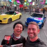 Cody Walker Instagram - Two kids in Times Square anxiously awaiting for this car to come out already. #blueonblue for me @larry_chen_foto #nissanz #fuelfest