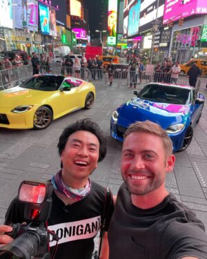 Cody Walker Instagram - Two kids in Times Square anxiously awaiting for this car to come out already. #blueonblue for me @larry_chen_foto #nissanz #fuelfest