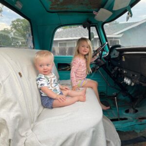Cody Walker Instagram - He can’t see over the steering wheel or reach the pedals but he’s absolutely determined to drive a manual. That’s my boy! #powerwagon
