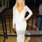Donna D’Errico Instagram – Great night at the annual @babes_for_boobs event last night. They auctioned off eligible bachelors onstage with all proceeds going to breast cancer research. Great cause and a super fun evening hosted by the ever handsome @joshmurray11 . I loved my beautiful dress by the amazing @ximenavalero. Beautiful hair by @magicofbeauty Vegan bag by @mooncanyon.co & @traceybregman1 ❤️ El Rey